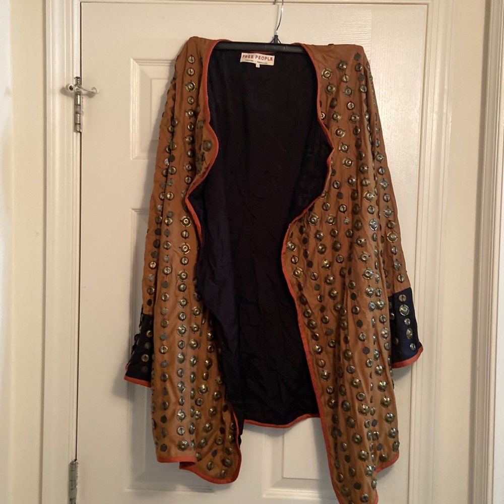 Worn 2 times. All coins still attached. Well taken care of